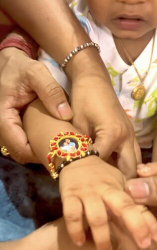 Customized to Photo print Rakhi for Men with Roli Chawal and Greeting Card photo review